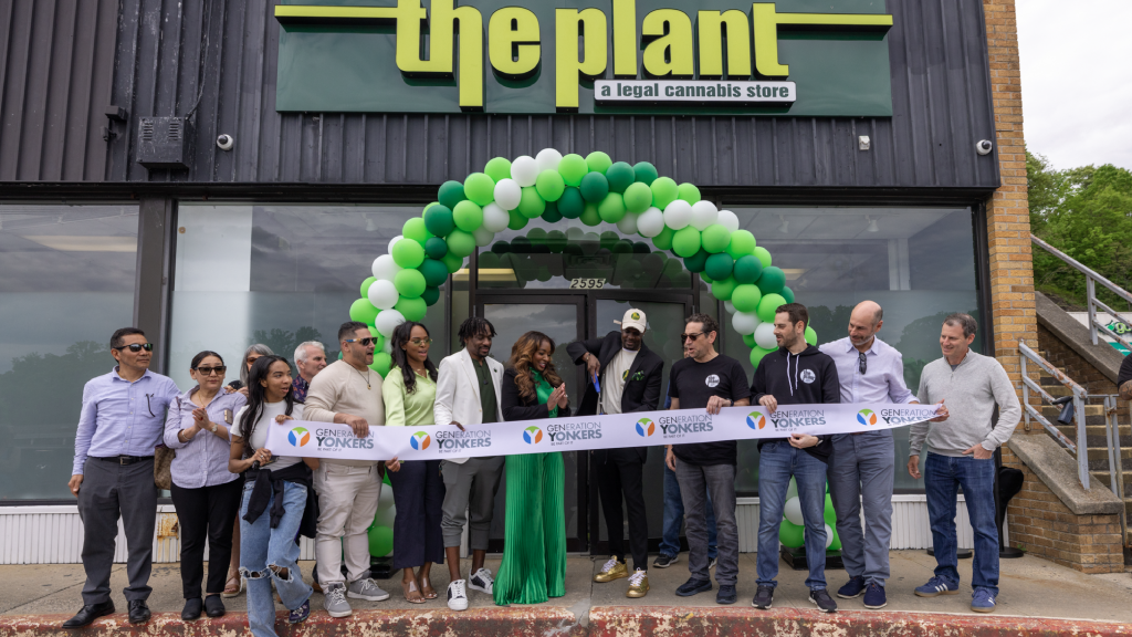 The Plant team and Yonkers Mayor Mike Spano at the ribbon-cutting ceremony, celebrating the dispensary's grand opening with balloons and smiles.